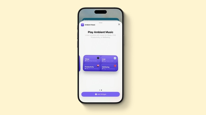 Ένα iPhone που εμφανίζει νέα γραφικά στοιχεία Ambient Music στο iOS 26.4